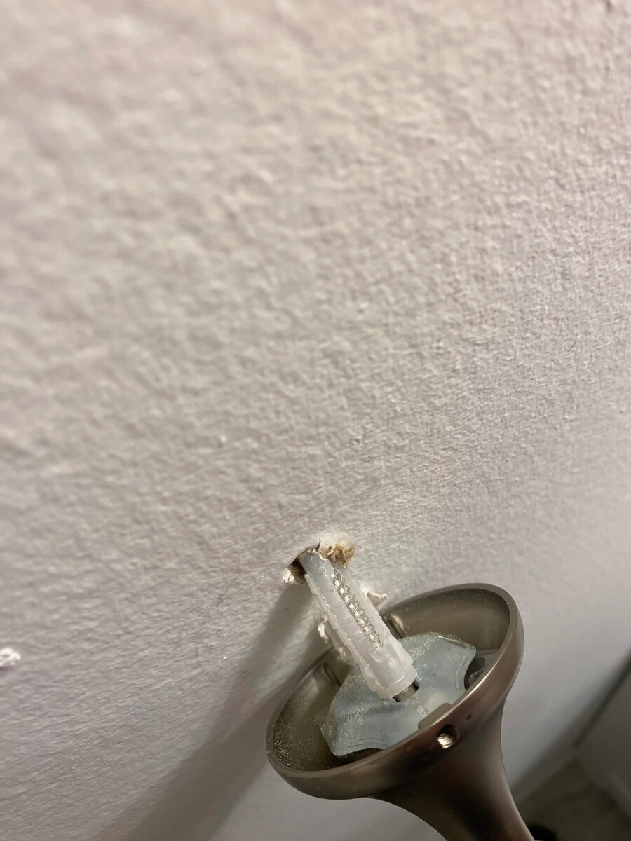 handyman - towel rack ripped out of wall