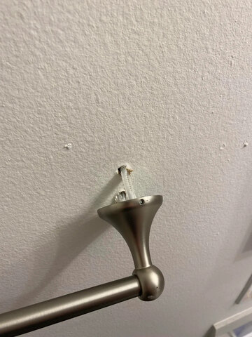 handyman - towel rack ripped out of wall