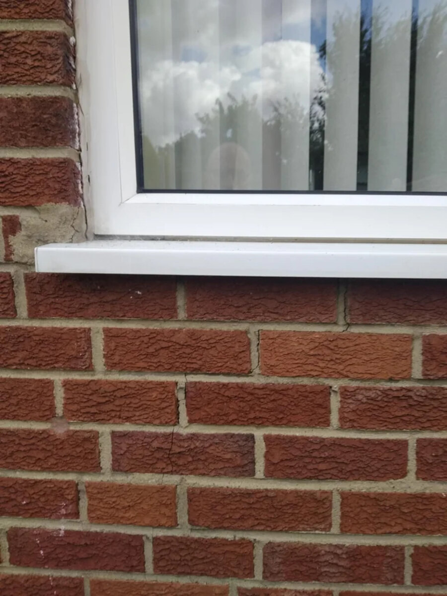 Need a Handyman – Small Crack in Living Room Window